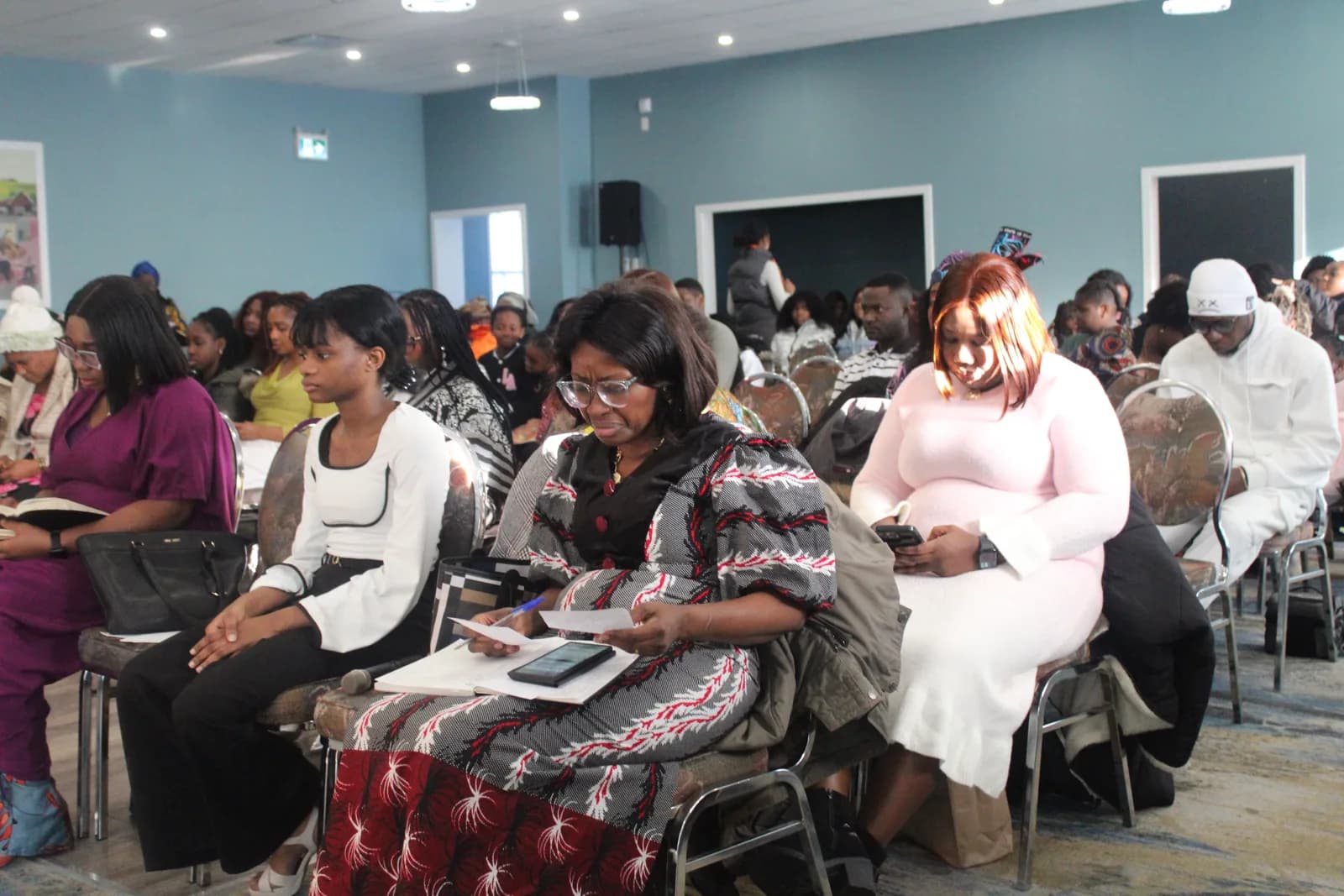 Church members worshipping together